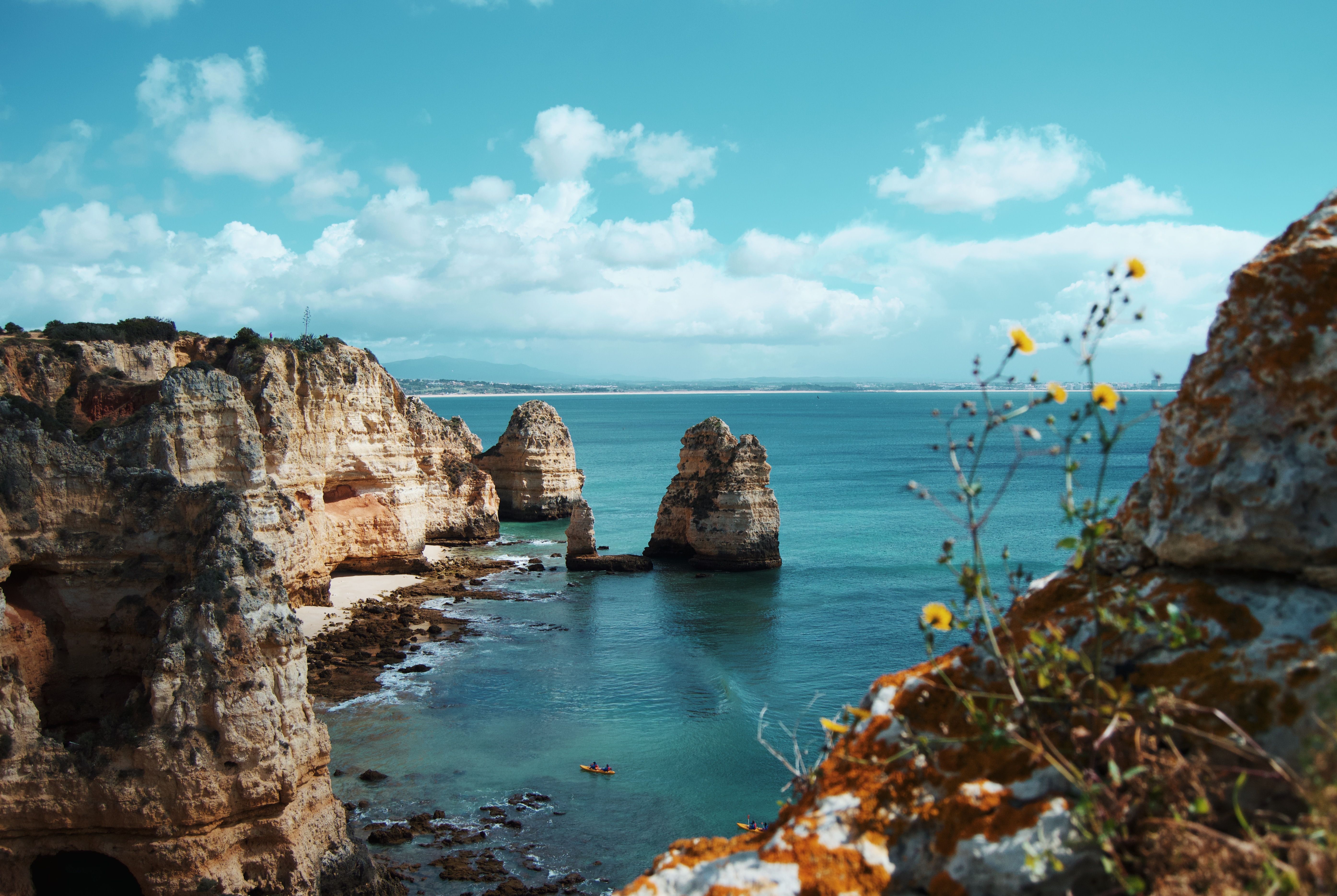 Coastal cliffs and turquoise sea in Lagos, Algarve